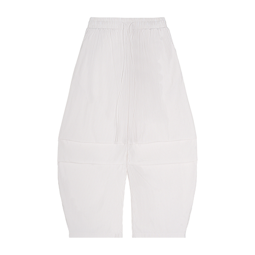 pantalone barrel,pantaloni leggeri,streetwear estivo,guscio tecnico,pantaloni oversize,estetica urbana,abbigliamento sardegna
