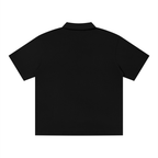 polo drop shoulder,polo strutturata,streetwear minimale,abbigliamento tecnico,estetica brutale,polo oversize,design sardo