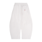 pantalone barrel,pantaloni leggeri,streetwear estivo,guscio tecnico,pantaloni oversize,estetica urbana,abbigliamento sardegna